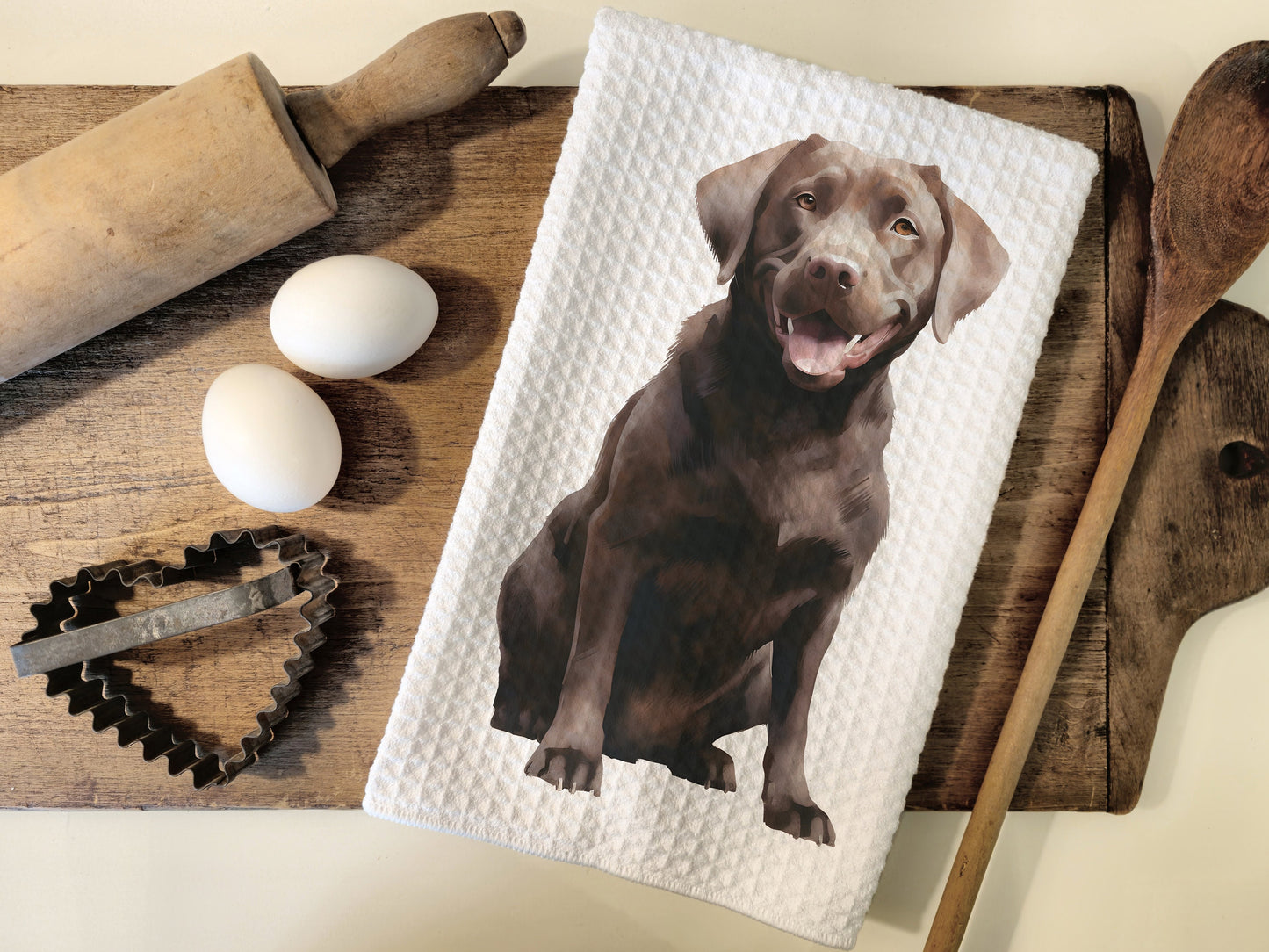 Chocolate lab on a kitchen tea towel as a gift.