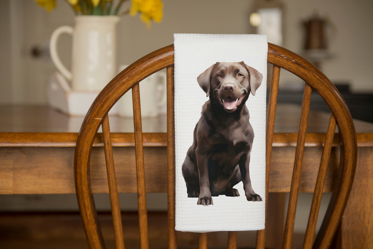 Chocolate lab on a kitchen tea towel as a gift.